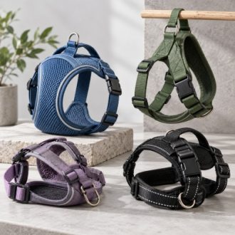 Adjustable pet harnesses with breathable mesh, padded straps, buckles and metal D-rings.